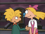 Arnold's hat on Helga's nose