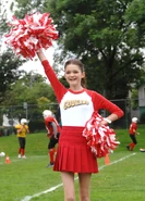 Ciara Bravo as a cheerleader in Jinxed as Meg Murphy.