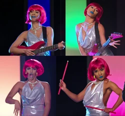 Stephanie look-alike, seen with the rest of the other instrument players on Jason Derulo's "Swalla" song.