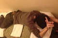 Asamaru lying on bed