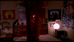 A fountain of blood bursts from Glen's bed after being killed by Freddy.
