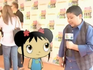 Kai-Lan having an interview with Rico Rodriguez at the premiere of the Mega Music Fest in 2010