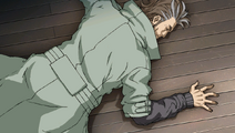 Hongou unconscious on the ground after his Soporil injection.