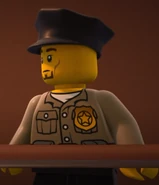 A guard with a beard (WILFilm ApS)