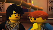 Master Garmadon hitting Jay on the head with a bo staff