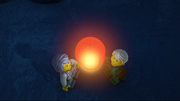 Misako and Lloyd releasing a lantern for the deceased Garmadon.