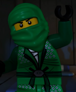 Kai wearing the Green Ninja suit