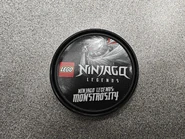 Ninjago Legends: Monstrosity Pop Badge given out at the LEGO booth.[7]