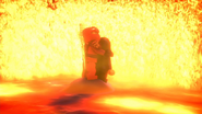 Kai shielding Lloyd from the flames