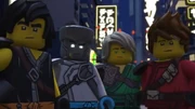 Cole and the others glaring at Jay and Nya