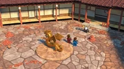Wu with Jay and Kai on the monastery's courtyard