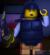 Кай в доспехах и держит саблю