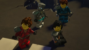 Kai, Jay, Cole, and Zane hear of the monastery's destruction