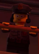 A female guard with glasses and black hair