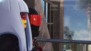 Harumi and Mr. E prepare to meet Emperor Garmadon atop Borg Tower.