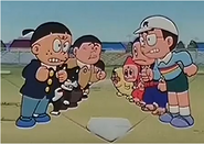 Kemumaki with his baseball team