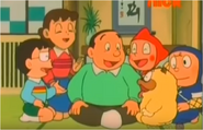 The family at home. From left: Kenichi, Mrs Mitsuba, Mr Mitsuba, Shinzo, Shishimaru, Hattori