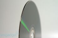 Side view of a Wii U disc, showcasing its rounded edge
