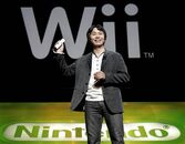 Miyamoto with a Wii Remote.