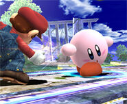 Kirby punching Mario