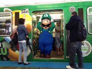 Nintendo tweeted this photo along with a message on Aug. 12 "Just stepped off the 'L' train at the Clark and Lake station and hit my head! Ow! Classic Luigi! #LuigiAndMe pic.twitter.com/2hBWiLXhLA"