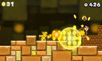 A screenshot of Gold Mario using his powers.