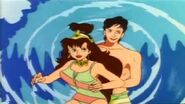Kevin and Lana surfing ("The Big Game")
