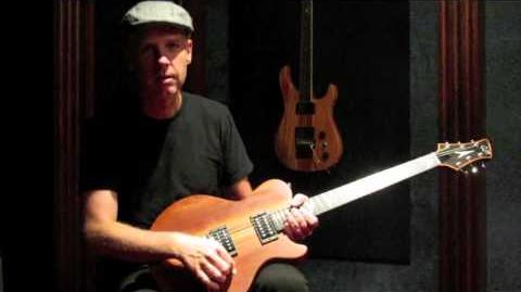 Tom Dumont with his Zora guitar (prototype 3) at GJ2 Guitars, made by Grover Jackson