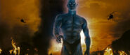 Dr. Manhattan, as he appears during the Vietnam War. This indicates that he was responsible for the American victory of the war.
