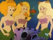 Three (human-sized) Mermaids and two small Snorks from the Hanna Barbera cartoon series Snorks.