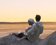 Lloyd & Evie watching the sunset together