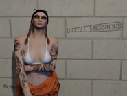 Mia next to the "Mersions" bat graffiti inside Bolingbroke Penitentiary