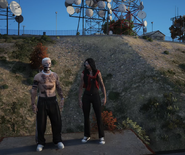 Front-facing shot of Cassie talking to Saint about Hades.