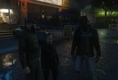 Ramee, Francis, and Vinny in front of the compound