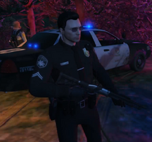 Snr. Officer Grimmer with a shotgun