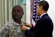 Jack receives his purple heart from Obama