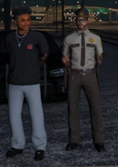 Ventura standing next to cuffed Larry Knox April 11th, 2025