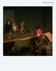 Mortelle in the Liquid Library meeting room after the jewelry store heist (Pictured left to right: , , , , and ).