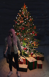 Abby by the Christmas tree
