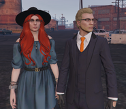 Lulu with her fiance Blanden Haster at someone's wedding