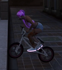 Molly on her bmx during the trick