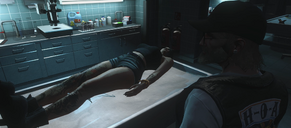 Rod says goodbye to Izzy at the morgue