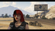 Lucy in front of the first Iron Hog Billboard.