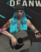 Sooty jamming on a washed acoustic guitar at Dean World
