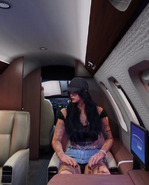 Cassie sitting in a private plane chartered by her husband for her 27th birthday on October 2, 2025.