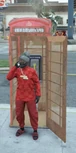 Wayne using a Dean Quincy phonebooth in Little Seoul