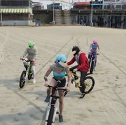 Veronica, Kiki, Parker, and Misa setting out on a bike ride