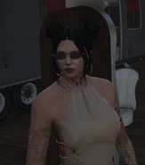 Cassie with her hair up in space buns.