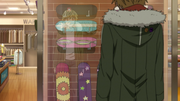 Yukine in front of a skate shop