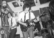 Mike Bradley, Trevor Daniels playing a Gibson SG - thus totally dating this photo to mid/late 70's (or now depending which bands you watch) 
